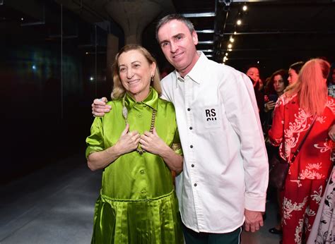 creative director of prada|miuccia Prada and raf simons.